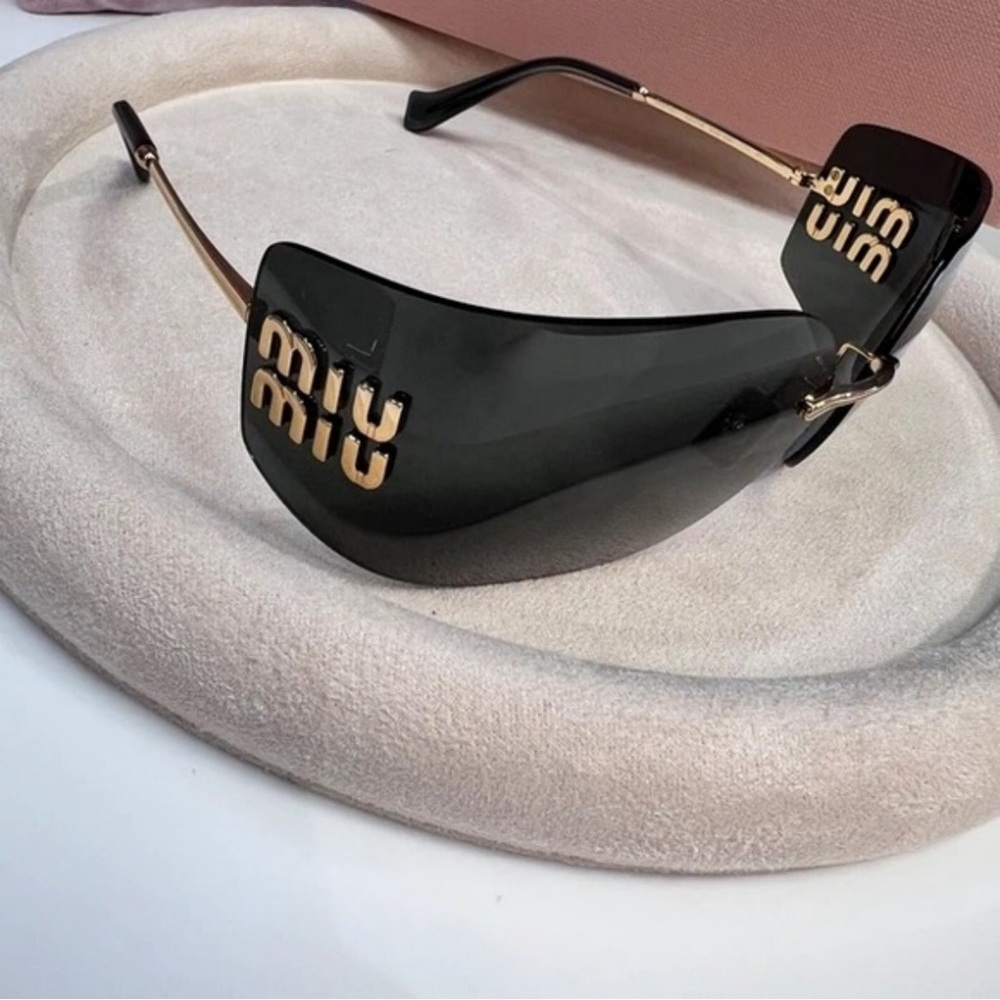 Miu Miu Black Shield Sunglasses with Gold Logo